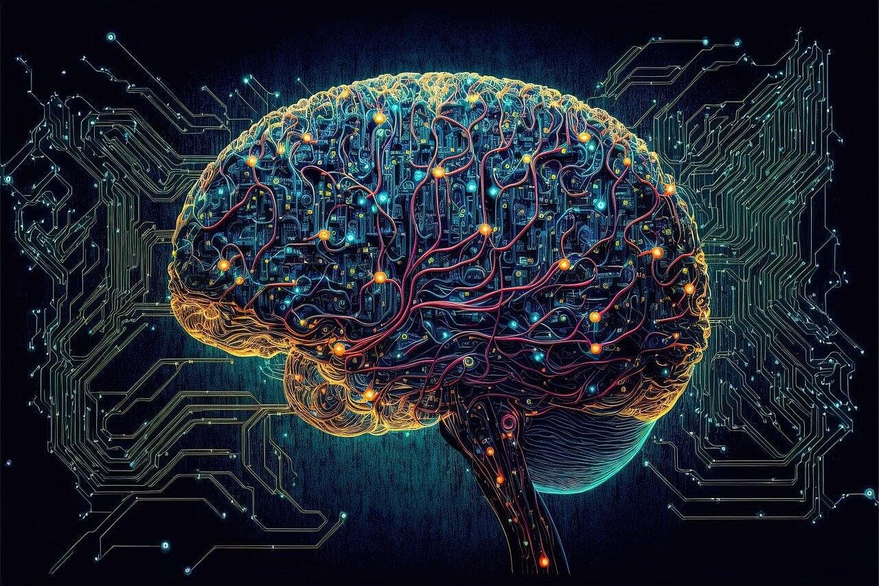 A blue brain shaped thing that has all these orange wires and lines going around it in front of a circuit board background.