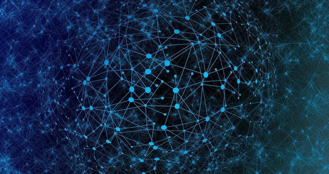 A sphere of blue lines and dots triangle connected to each other in front of a wall of even more blue connected lines and dots.